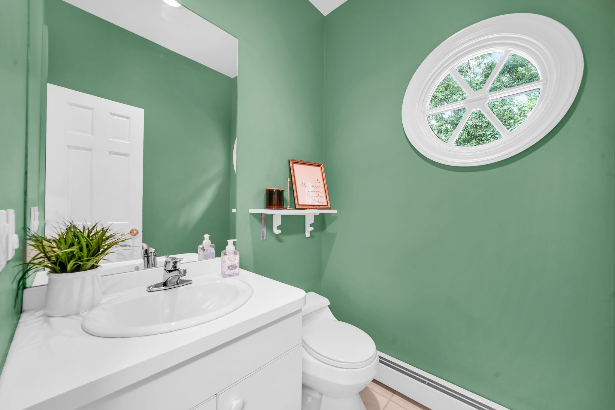 Just beyond, a landing off the second staircase holds a true mudroomcoat closet, and a powder room tucked neatly away, and direct access to the garage.