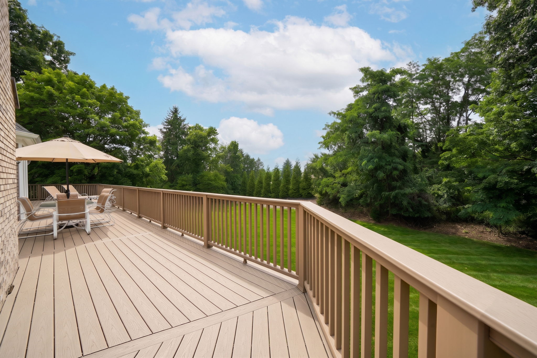 French doors open onto an expansive back deck from kitchen, Great Room and the Laundry Room.