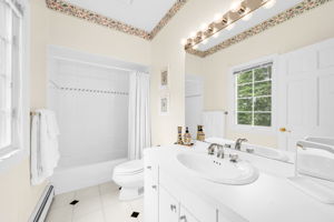 First floor bedroom, complete with its own full en-suite bath, is tucked quietly into the back of the home, offering privacy for guests, au pair, or multigenerational living.