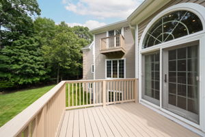 French doors open onto an expansive back deck from kitchen, Great Room and the Laundry Room.