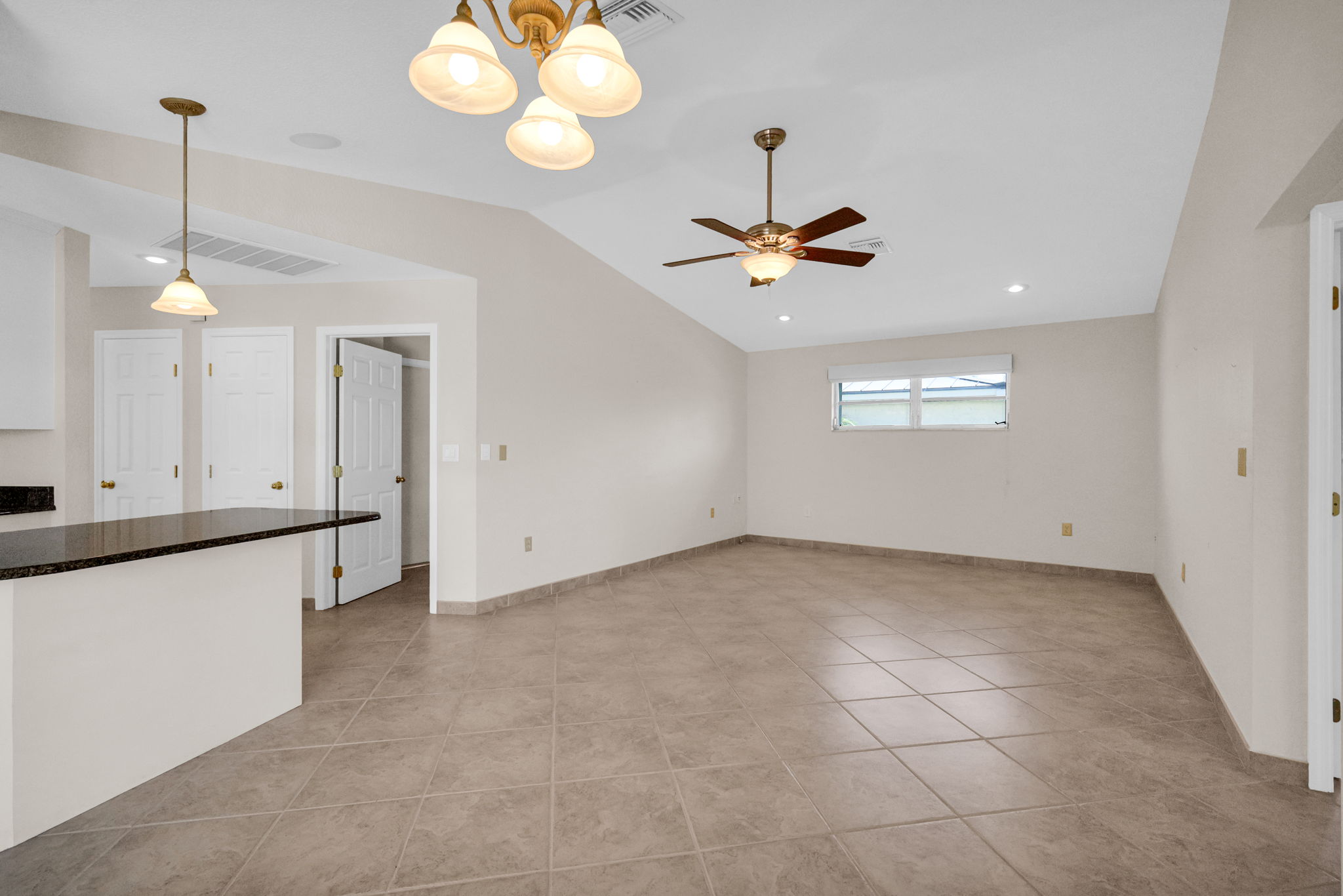 Virtually Staged - Large Family Room with high ceilings