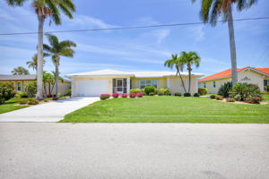 Nestled on a beautiful street in Punta Gorda Isles