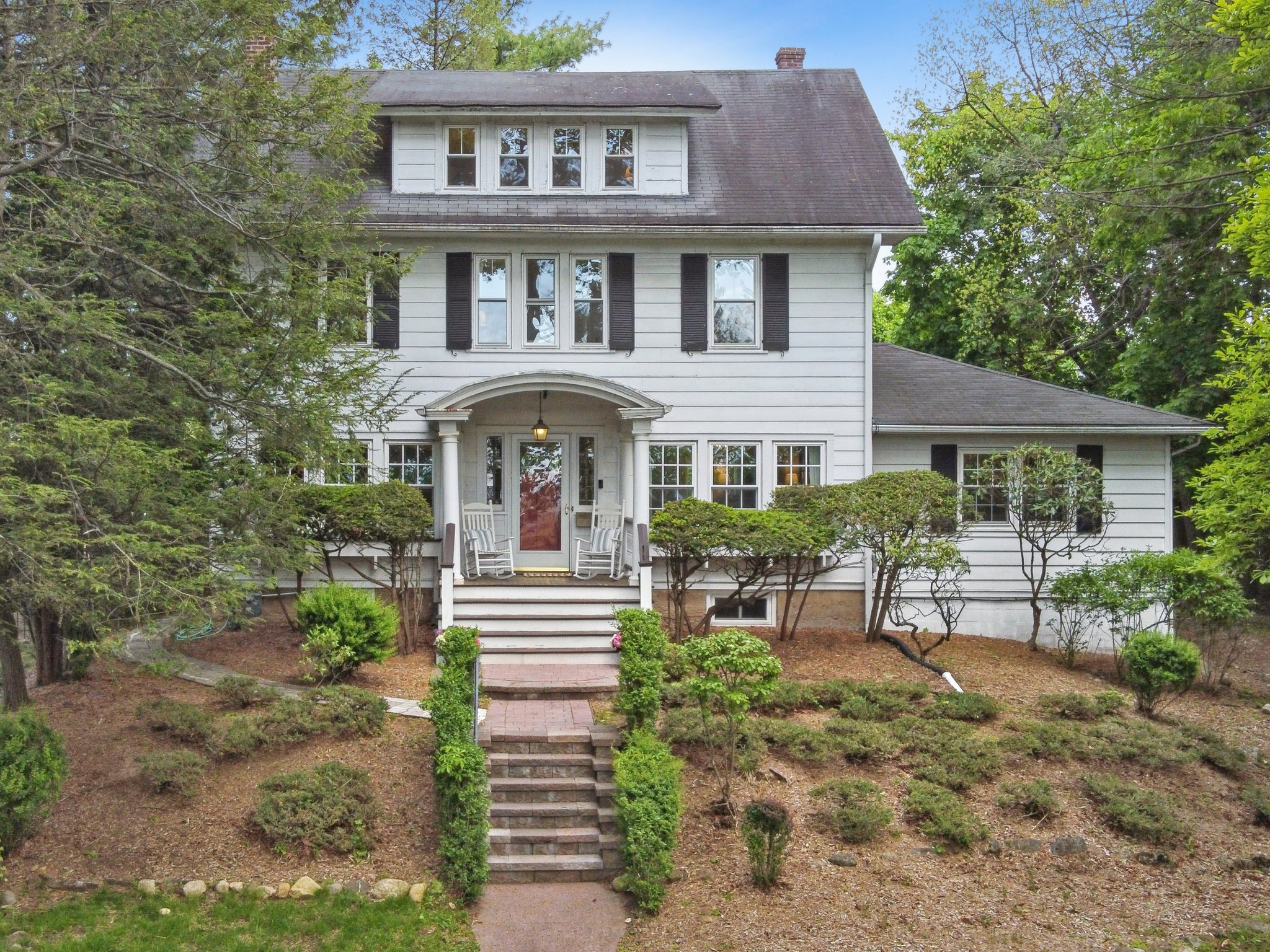Perched proudly atop the hill, this timeless Caldwell home feels quietly rooted in its surroundings — surrounded by trees, bathed in western light, and watching over generations of laughter, gatherings, and life beautifully lived.