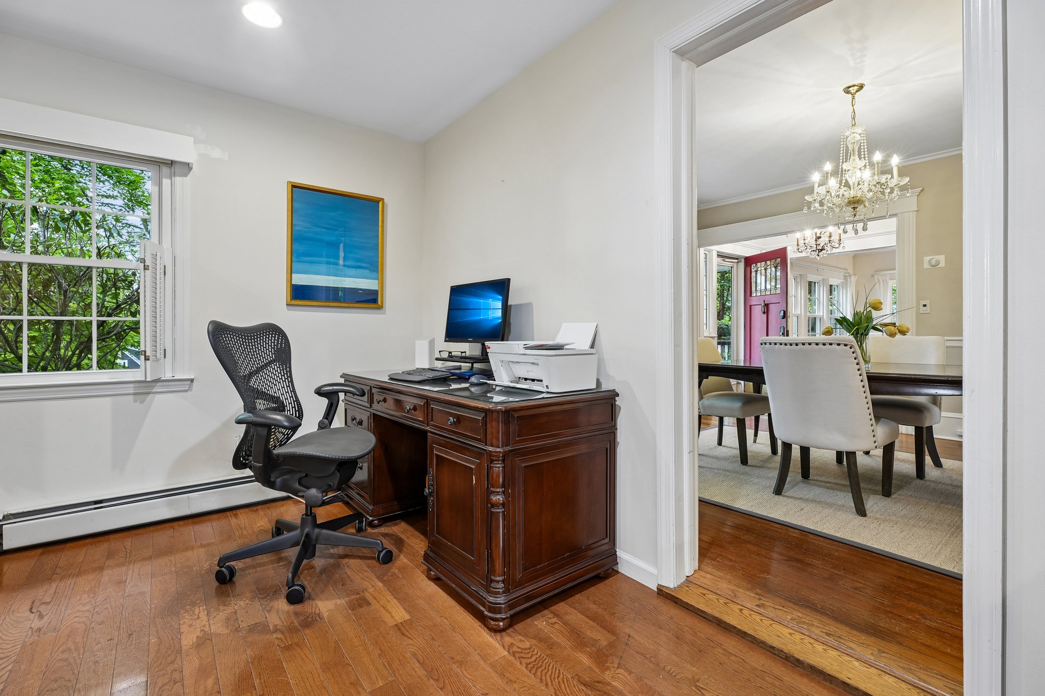 A dedicated workspace tucked in a corner of the family room  - close enough to stay connected to family life, but just removed enough for Zoom calls, homework sessions, bill paying, recipe searching, fantasy football management, and finally answering those emails.