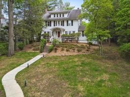 A classic center hall Colonial with unmistakable farmhouse energy - where sunset views, sprawling lawns, muddy boots, pancake breakfasts, gardens, and generations of memory-making all feel beautifully at home.