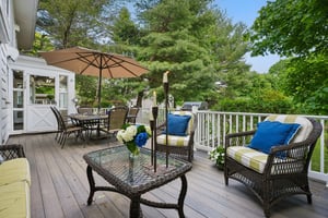 A deck made for memory-making overlooks an extraordinary 75 x 390 property - nearly two lots in one.