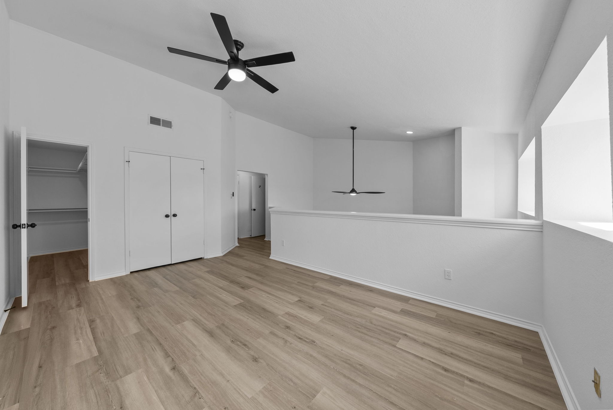 Upstairs bedroom. Pics of upstairs updated bathroom not available. It's through the door in the middle of the pic.