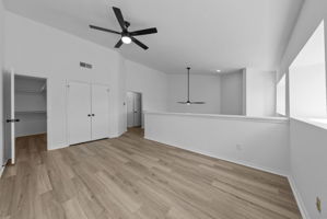 Upstairs bedroom. Pics of upstairs updated bathroom not available. It's through the door in the middle of the pic.