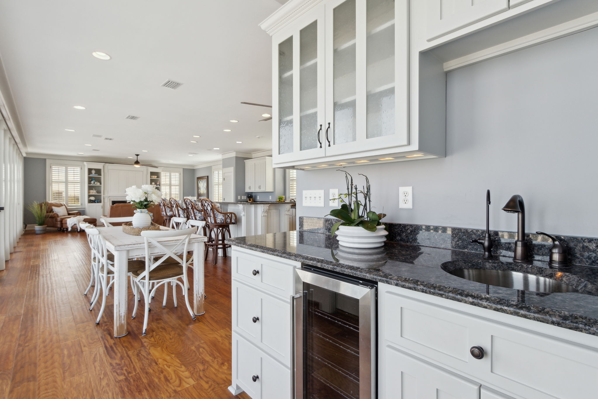 A nearby wet bar elevates your entertaining experience...