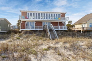 ... this home exudes both timeless coastal charm and unbeatable resilience against the elements.