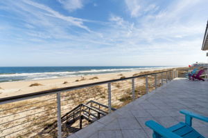 The second floor deck features a spiral staircase access to the 2nd deck below ...