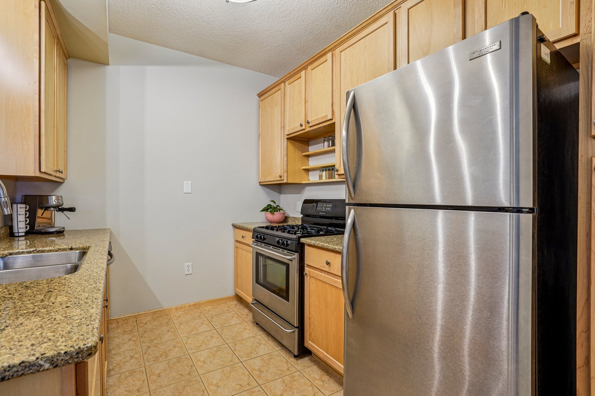 Kitchen with stainless-steel appliances