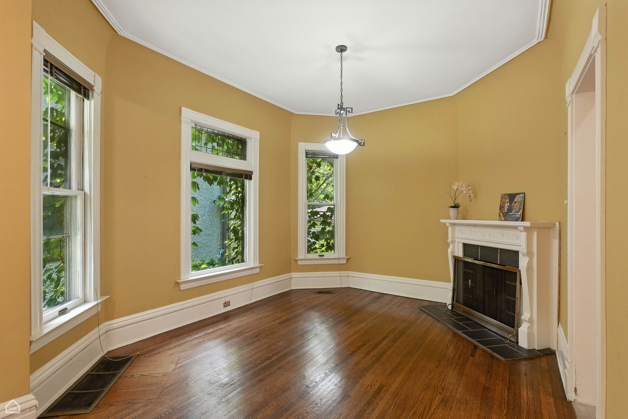 Dining room with fireplace and mantle