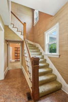 Front staircase, there is also a second staircase off the kitchen