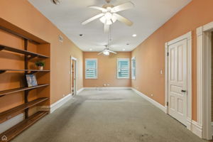 Huge and open family room with large closet and built in bookcase
