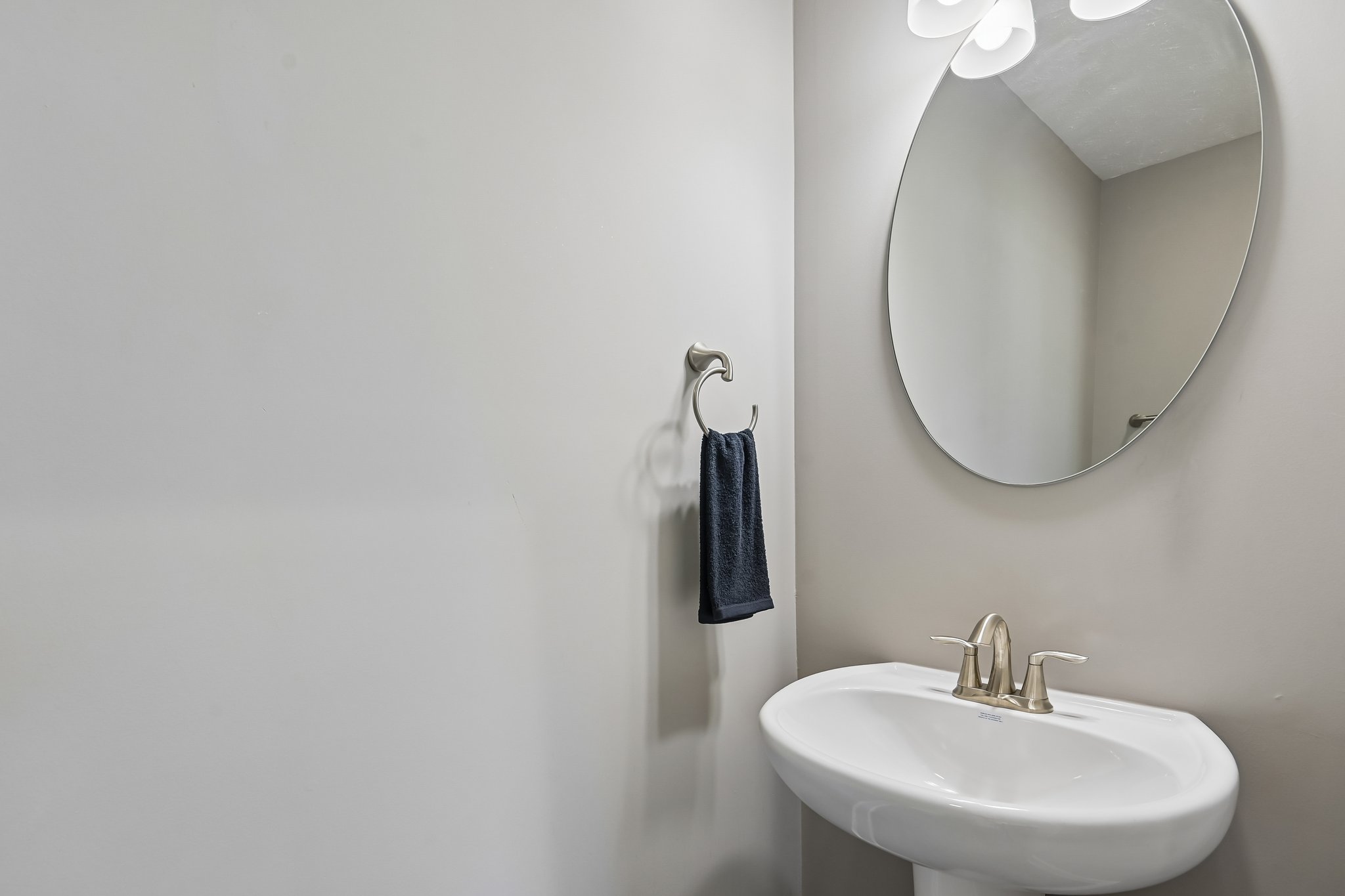 Convenient main-level powder room for guests.