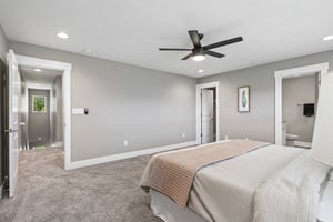 Thoughtfully designed primary suite with easy access to bath and walk-in closet.