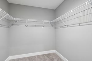 Walk-in closet offers excellent organization and storage space.