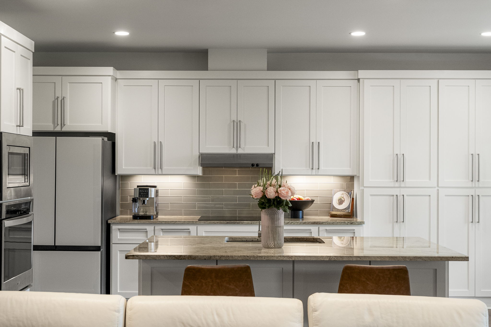 Extensive cabinetry and generous counter space provide the storage and functionality every home chef will appreciate.