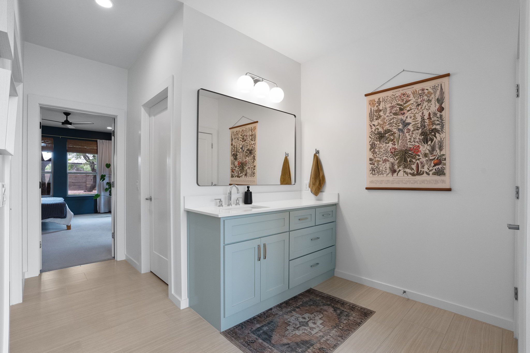 A second, separate vanity offers added convenience and plenty of room to get ready for the day