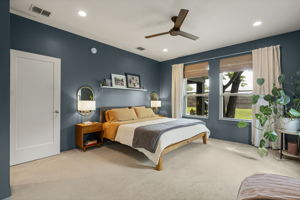 Warm, inviting tones and large windows overlooking the backyard create a peaceful retreat you'll look forward to coming home to.