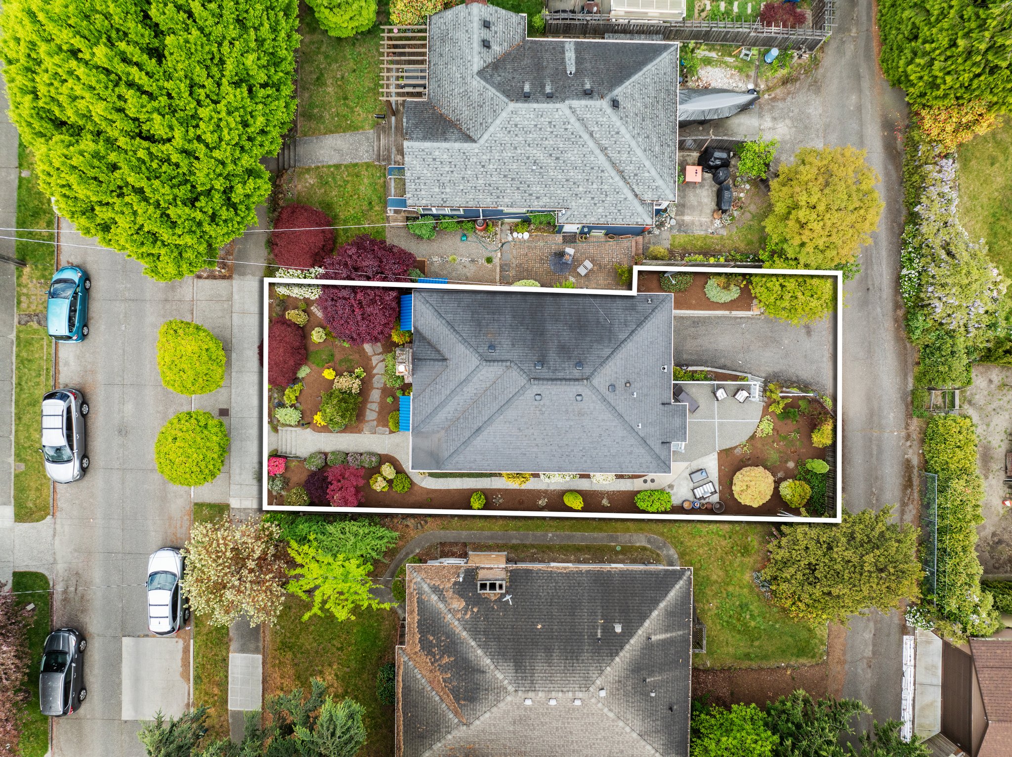 Great quiet tree lined street with alley access to garage & parking