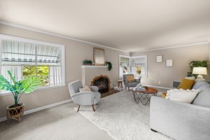Wonderful huge living room w/great windows with beautiful gas fireplace & mantel