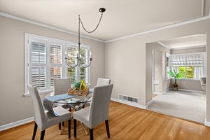 Dining area is spacious and you will love the wood shutters