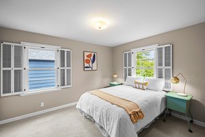 Bedroom #1 also with wood shutters