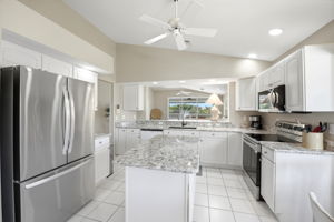 Kitchen with new stainless appliances and center island