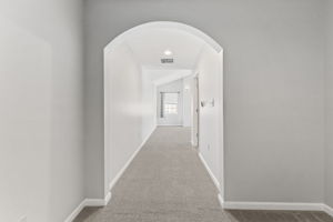Walkway from sitting room to primary bedroom
