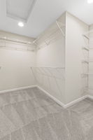 1 of 2 primary bedroom closets