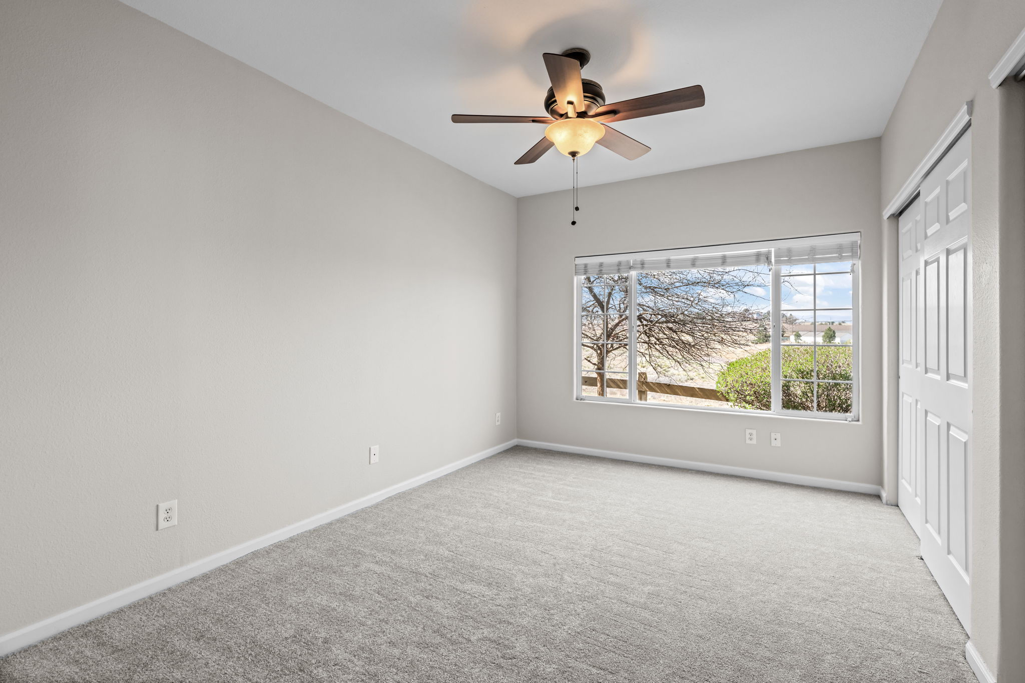 Secondary bedroom without Virtual Staging, views of open space and mountains
