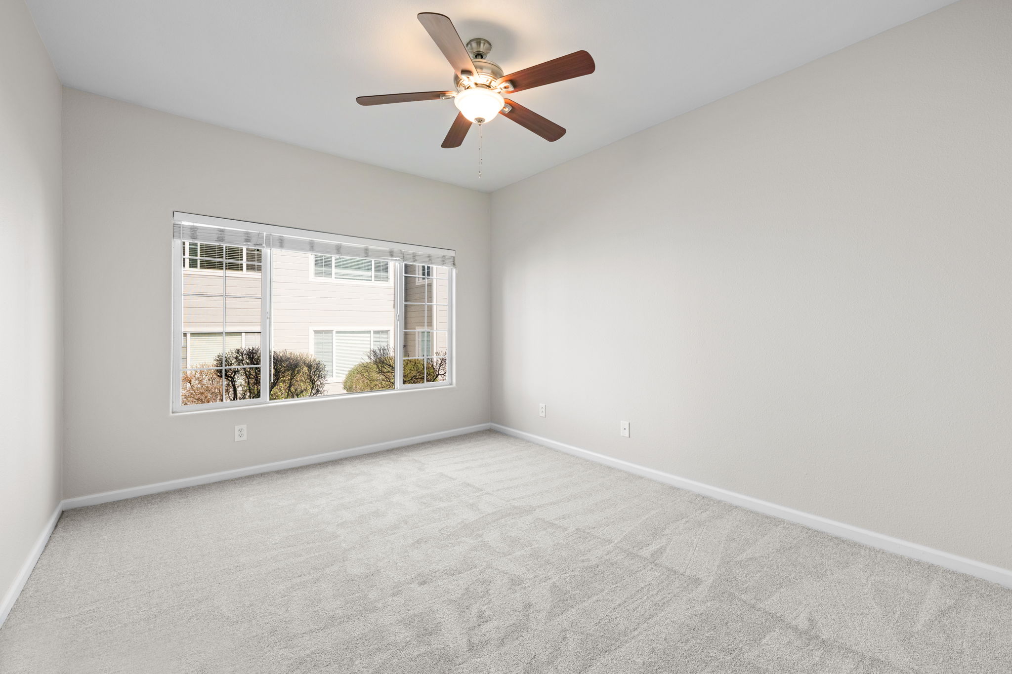 Note new carpet; primary bedroom without virtual staging