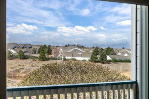 View from the covered patio of the open space, panoramic mountain views & beautiful sunsets