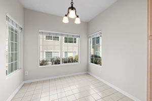 Breakfast Nook without the virtual staging - notice windows & light from all three sides