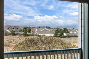 View from the covered patio of the open space, panoramic mountain views & beautiful sunsets