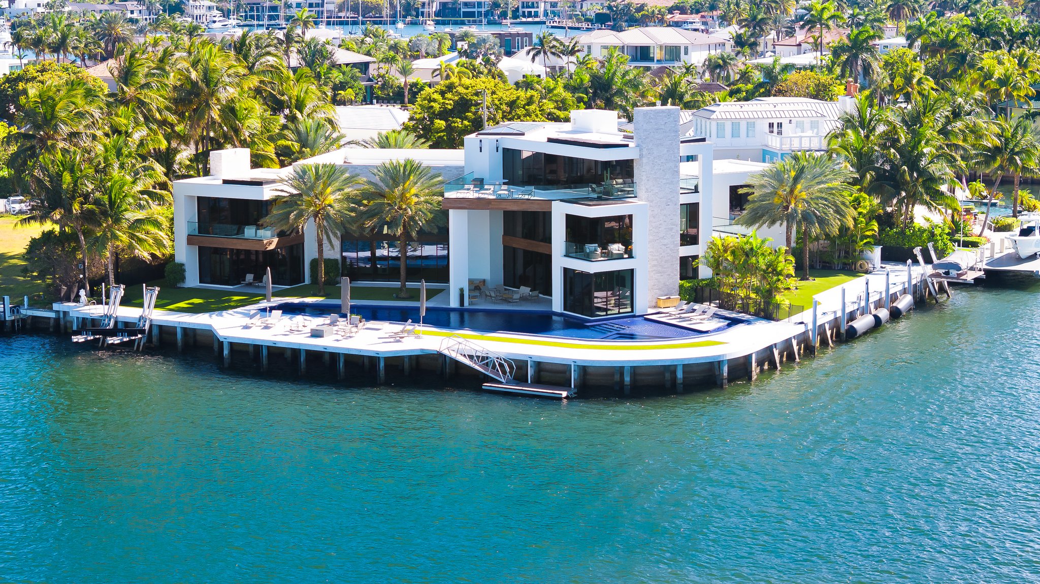 Aerial view of 84 Isla Bahia, a waterfront point lot estate with infinity pool in Harbor Beach, Fort Lauderdale