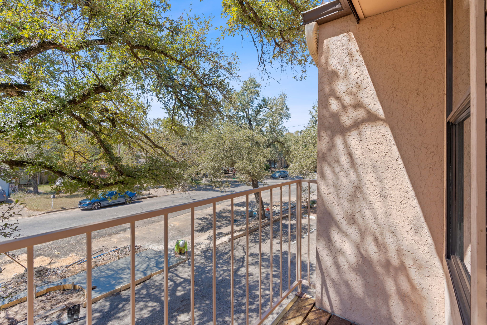 Balcony off the primary bedroom (overlooks private parking lot)