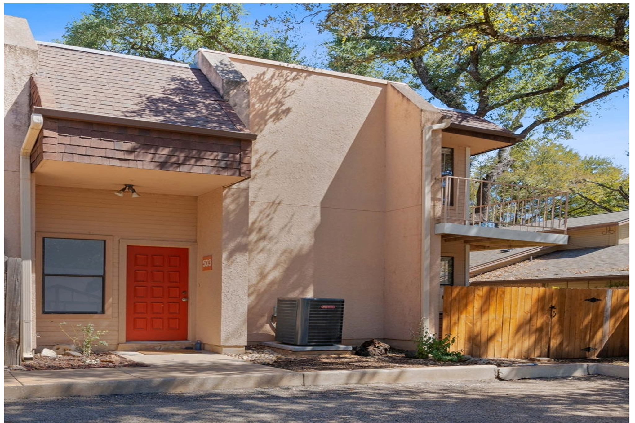 Front-facing view (showing privacy fenced patio area)