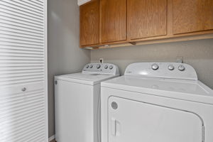 Second story dedicated laundry area with recent washer/dryer