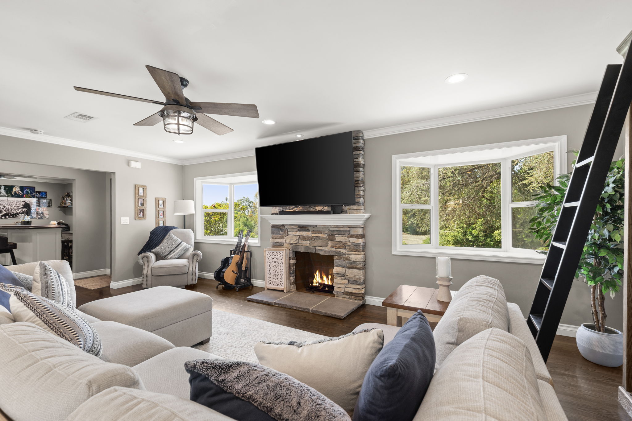 Warm and Inviting Living room which opens to dining room and kitchen