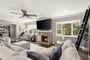Warm and Inviting Living room which opens to dining room and kitchen