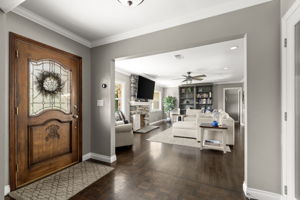 Entry to Living Room and Hardwood floors throughout home