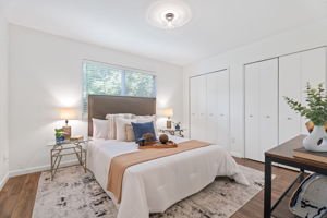 Two closets in primary bedroom
