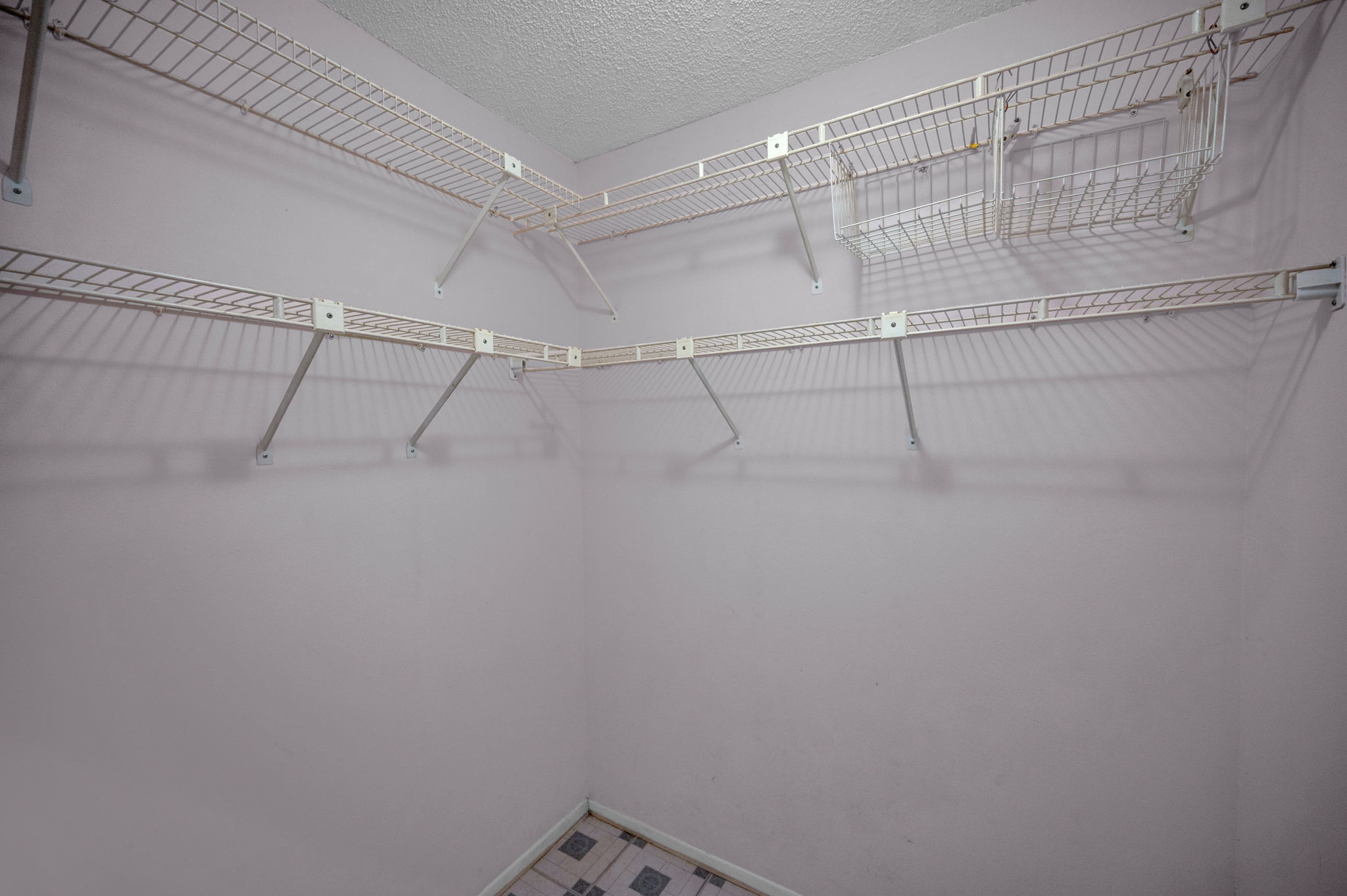 Primary Bedroom Walk-in Closet1a