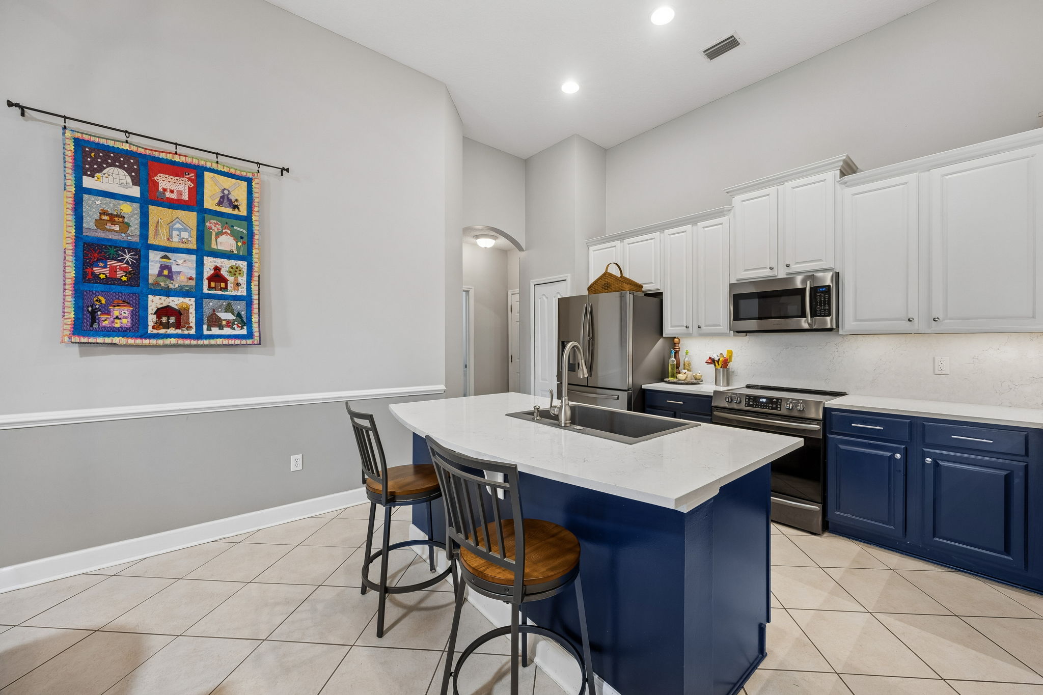 Island seating is perfect for casual dining or entertaining.