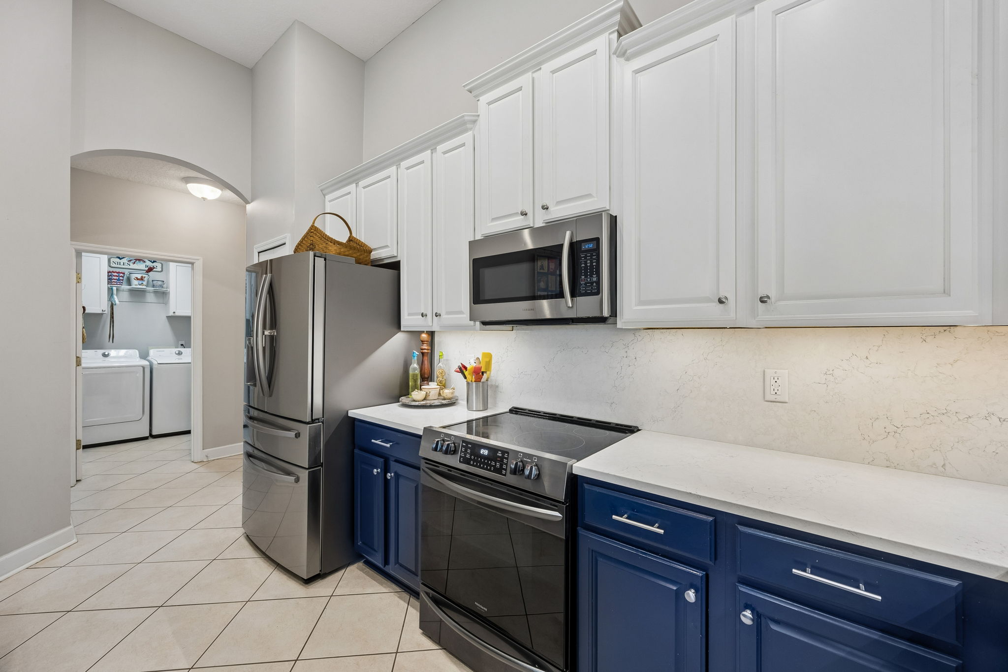 Bright and airy kitchen featuring stainless steel appliances