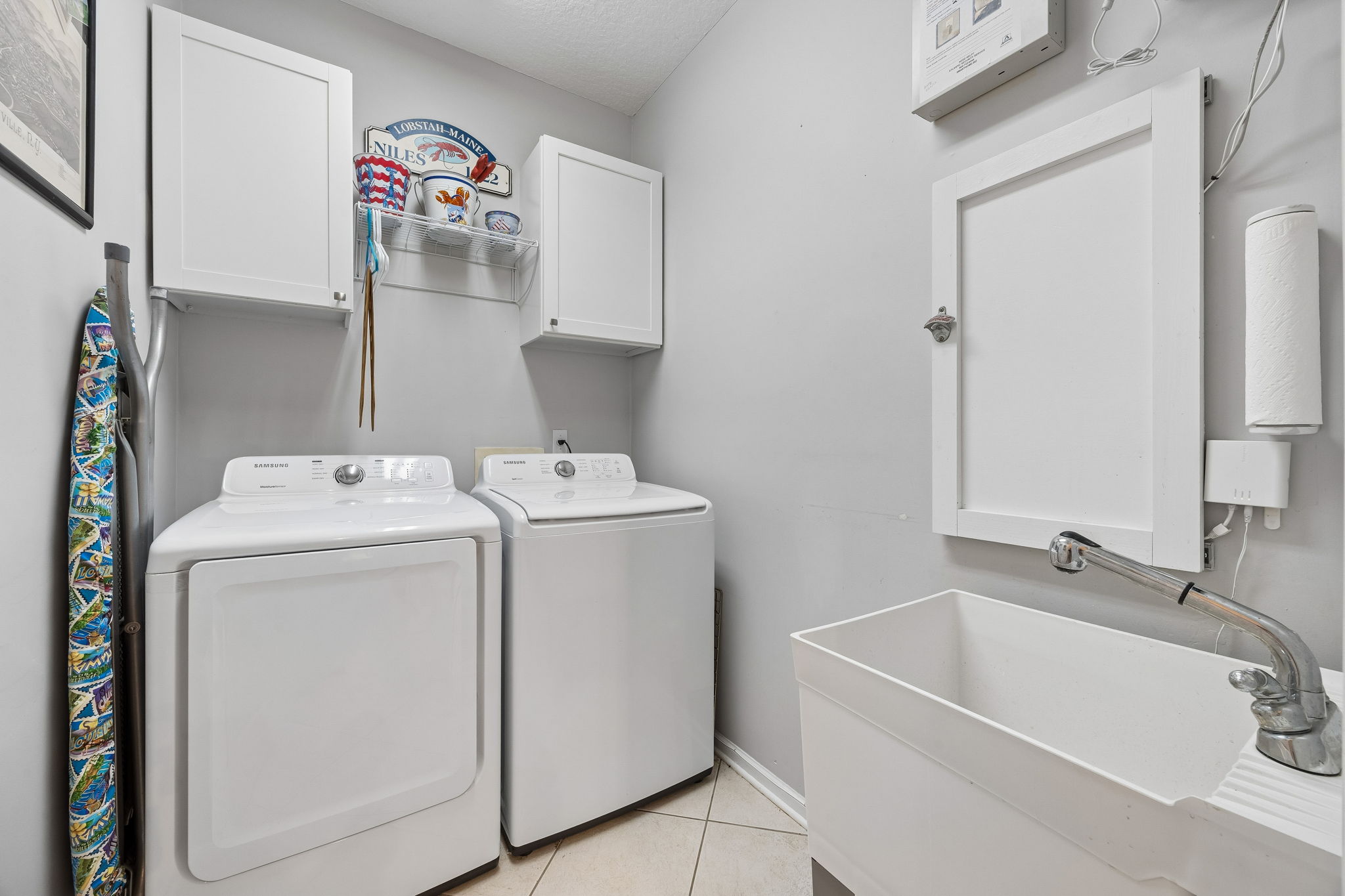 Separate laundry room just off the garage for everyday convenience and organization.