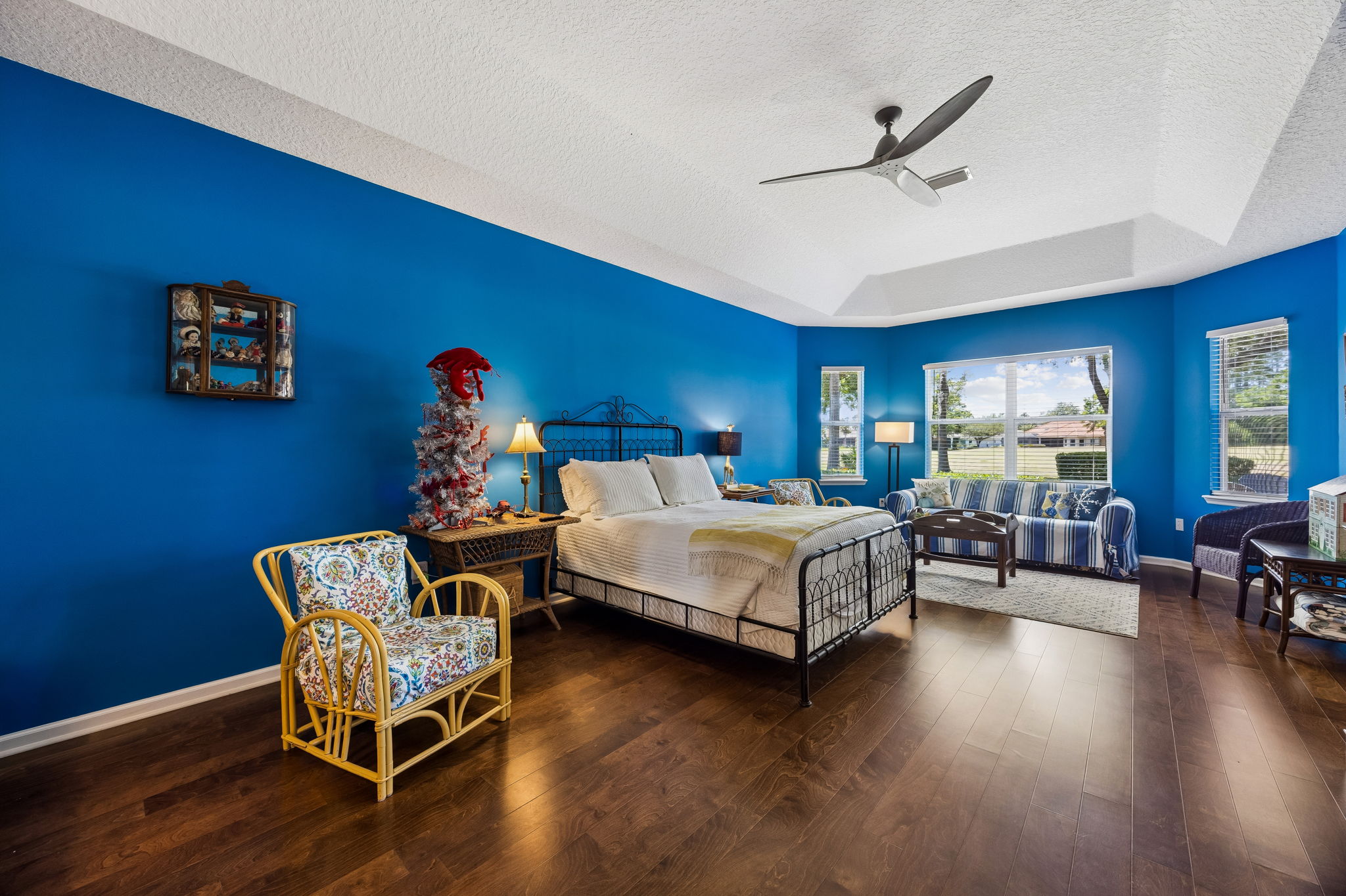 Spacious primary bedroom filled with